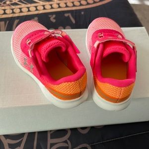 Pink under armor little girl track shoes